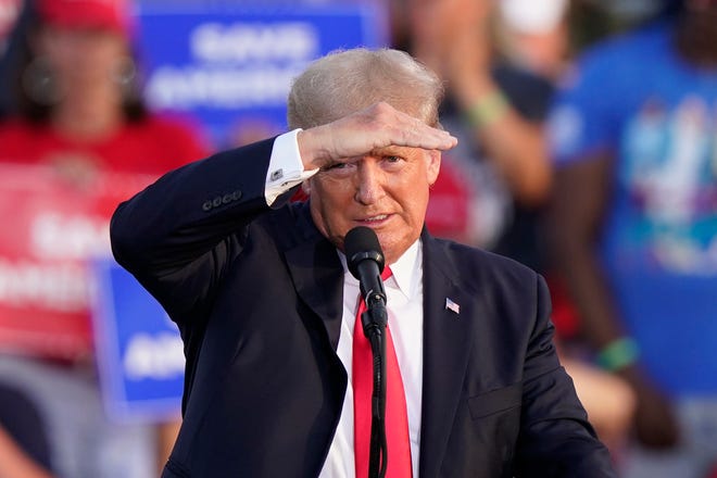 Former President Donald Trump looks out at his supporters as he speaks at a rally at the Lorain County Fairgrounds, Saturday, June 26, 2021, in Wellington, Ohio. (AP Photo/Tony Dejak)